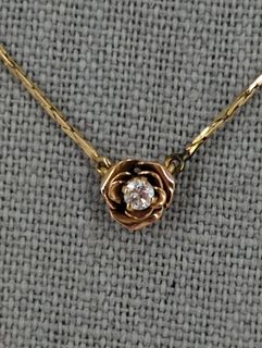 14kt Dual Tone Necklace With A Diamond Pendent