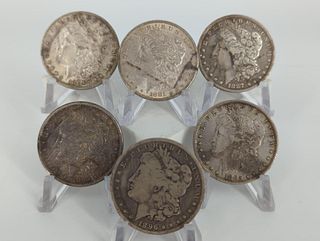 Six U.S. Morgan Silver Dollars