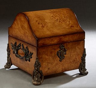 Bronze Mounted Burled Mahogany Jewelry Box, 20th/21st c., the domed top opening to a velvet lined interior with lift out trays, the sides with bronze 