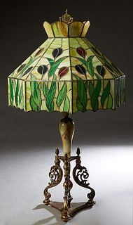 Unusual Large Slag Glass and Onyx Table Lamp, with an octagonal slag glass shade with leaf decoration, on a brass base with an onyx center column flan