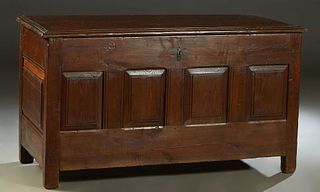 French Provincial Louis XIII Style Carved Oak Coffer, 19th c., the stepped rectangular top over fielded panel front and sides, on block feet, H.- 32 1