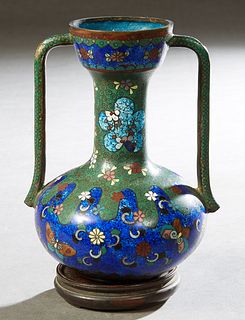 Chinese Cloisonne Bronze Handled Baluster Urn, 19th c., with floral and butterfly decoration, H.- 6 in., W.- 4 1/2 in., D.- 4 in. Provenance: Palmira,