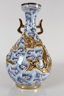 A Chinese Duo-handled Plated Blue and White Dragon-decorating Porcelain Vase 