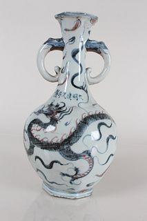 A Chinese Duo-handled Dragon-decorating Porcelain Vase 