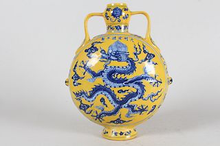 A Chinese Duo-handled Yellow-coding Dragon-decorating Fortune Porcelain Vase 