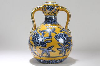 A Chinese Duo-handled Yellow-coding Porcelain Fortune Vase 