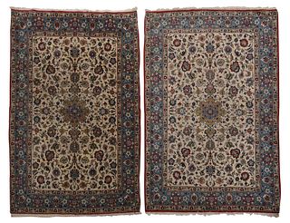 Two Similar Persian Rugs