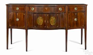 Federal mahogany sideboard, ca. 1800, with large griffin inlaid oval cartouches