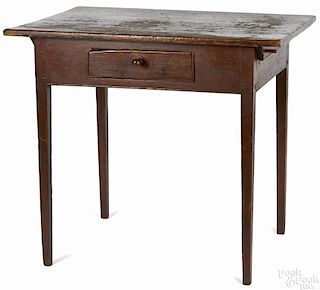 Painted pine work table, 19th c., with a batten top, retaining an old red surface, 30 1/4'' h.