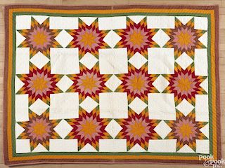 Pieced star pattern quilt, late 19th c., 77'' x 57''