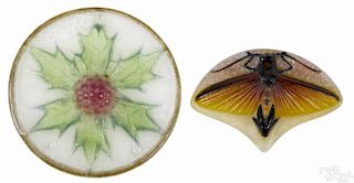 Two G. Argy Rousseau pendants, 2 1/2'' dia. and 1 1/2'' h., 2 1/4'' w.