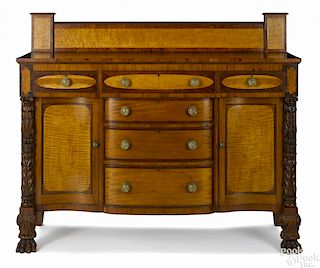 Empire mahogany, cherry, and curly maple sideboard, ca. 1835, with flame panel drawers
