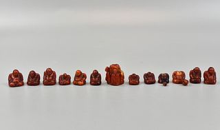 Group of 13 Miniature Beeswax Buddha Figure