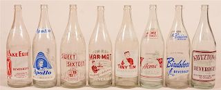 Lot of 8 Vintage Painted Label Glass Soda Bottles.