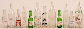 Lot of 12 Vintage Painted Label Glass Soda Bottles.