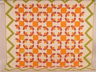 Geometric and Floral Pattern Patchwork Quilt.