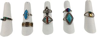 Eight Sterling Silver Southwestern Style Rings