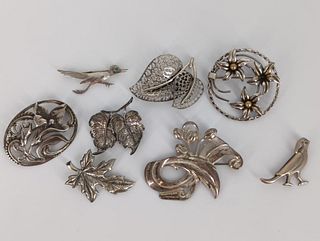 Eight Sterling Silver Pins