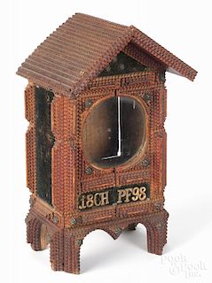 Tramp art carved clock case, dated 1898, initialed CH PF, with fabric-covered side panels