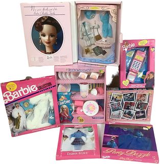 (7) Very nice Barbie items including a sealed puzzle, (3) Barbie boxed outfits, Barbie collectors club folder w/ outfit, sealed cellphone and sealed C