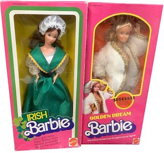 (2) 1980's Pink boxed Barbies including (1) Irish Barbie & (1) Golden Dream Barbie. Golden Dreams Barbie is MIB. Irish Barbie's box has crimping & wea