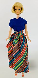 1965/66 Transitional American Girl Barbie. Lips have non-fading coral paint. Wearing Pak separates.