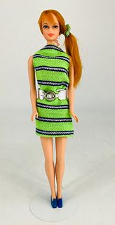 1970 Talking Stacey. Arms and legs attached, hips are frozen, mute. Wears #1452 "Now Knit", no hat or scarf.