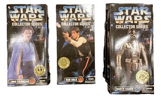Lot of 4 including Star Wars Collector Series Lando Calrissian (box ripped), Han Solo and (2) Darth Vader. All boxes show wear.
