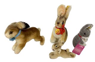 Lot of (4) Steiff Rabbits including 4 1/2" light brown Lying Rabbit 1953-1967, 8" tall light brown Sonny Rabbit 1968-1976, 6" tall grey Manni Rabbit a