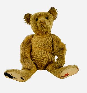 19" antique straw filled mohair jointed bear with button eyes and stitched nose (missing) and yarn mouth, shows wear including tears, thinning of moha