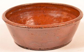 Redware Flared Edge Bowl with Molded Rim.