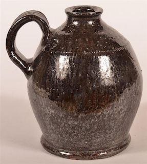 19th C. PA Glazed Redware Jug with Strap Handle