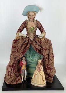 "Good Night, Posterous" by doll artist Nancy Wiley. Paper clay lady with molded and painted hat, hair and facial features, brocade gown, painted inser