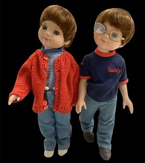 Lot of 2 Sandy McCall by Robert Tonner dolls @ approx 14" tall, circa 1999. Dolls have inset eyes, are of hard vinyl and one doll has glasses as an ac
