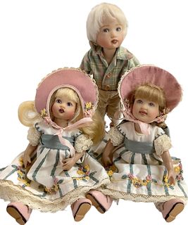 Lot of 3 pretty Kish & Co towheads @ approx 8" tall w/lovely costumes. Dolls are made of hard vinyl and boy doll is circa 2005. Dolls are five-jointed