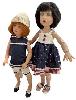 Lot of 2 Kish & Co dolls done in hard vinyl. Tallest is 12" and multi-jointed, having a patriotic themed outfit. Redhead doll is 11" tall and is dress