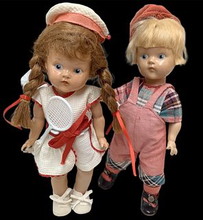 Lot of 2 Toddles dolls in composition material and 8" tall. Painted faces with blue eyes, both are incised "Vogue Doll" on their backs. Someone has gl
