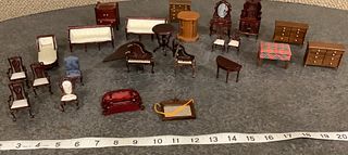 Lot of miniature dollhouse furniture and accessories. Furniture made from wood/plastic. One arm rest is broken off tan chair.