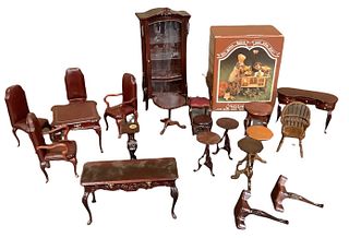 Lot of 21 pieces of miniature doll furniture in different wood tones. Made out of wood/plastic. Some items made by Bespaq. The wood curio cabinet is b