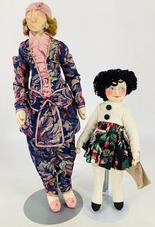 (2) Cloth dolls by artist Marla Florio. Includes 18 1/2" Smoker with hand painted facial features, mohair wig, cigarette with feather "smoke", and 13"