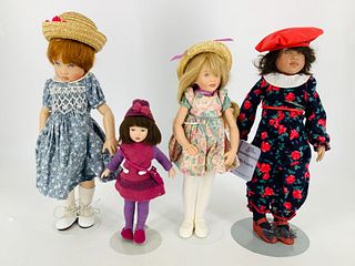 Lot of 4 dolls, w/3 identified as Kish & Co. Doll in red hat is approx 12" tall and has manufacturerÃ­s hang tag from 1994/95 naming her Michaela. All