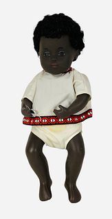 12" vinyl Sasha Black Baby (509) w/tag and box, there are stains on pants. Box has rips, stains, shelf wear and cellophane is missing.