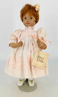 Janci Dolls carved wood doll "Becky". 12" flange head doll with human hair wig, painted facial features, on cloth body with carved wood lower arms and