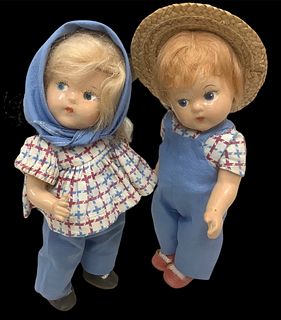 Lot of 2 Toddles composition dolls @ 8" tall. Both faces have crazing, girlÃ­s face has a repainted eye. Back of girl incised DOLL CO, back of boy inc