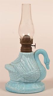 Blue Milk Glass Swan Miniature Fluid Lamp.