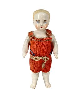 China Frozen Charlie. 9" doll with molded and painted blonde hair and facial features, lightly incised number upper rear torso (shown).