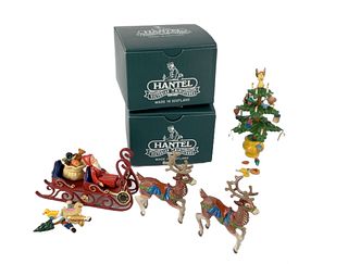 Multiple lot of Hantel Christmas themed miniatures in pewter, tallest @ 4". There is a jointed Santa, reindeer, a sleigh and notably, a tree where mul