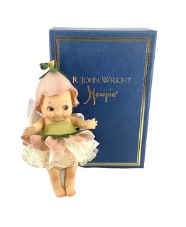 R. John Wright darling Kewpie themed doll titled "Fleur." DollÃ­s original hangtag included which identifies item as #049/250, doll is 6" tall and is 