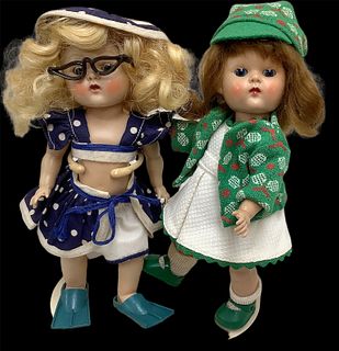 Lot of 2 Ginny dolls @ approx 8" tall, includes a darling swimming motif doll w/blonde hair, glasses, fins and a costume w/Vogue manufacturerÃ­s tag. 
