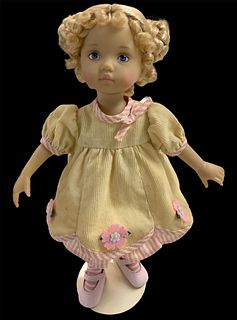 Darling Dianna Effner "TuesdayÃ­s Child" doll in hard vinyl w/painted face @ approx 10 1/2" tall. She has a corduroy fabric dress w/pink flower appliq
